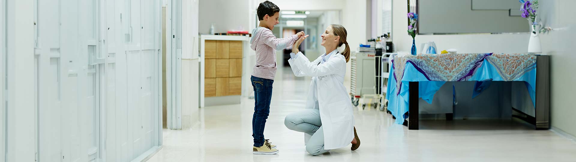 A person and a child high fiving