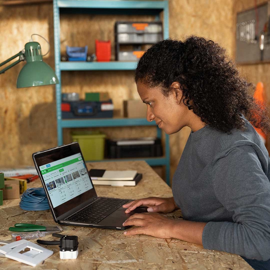 Electrician women navigating on a website