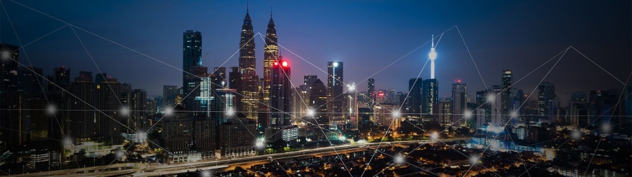 view of city at night under white mesh