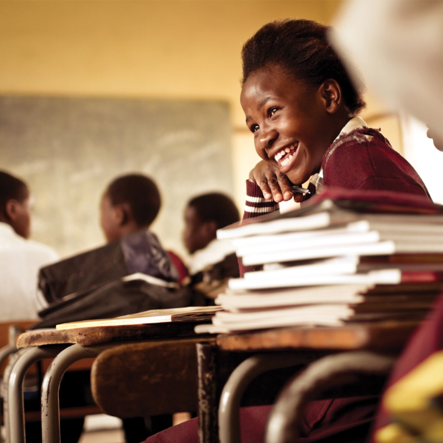 child smiling in school