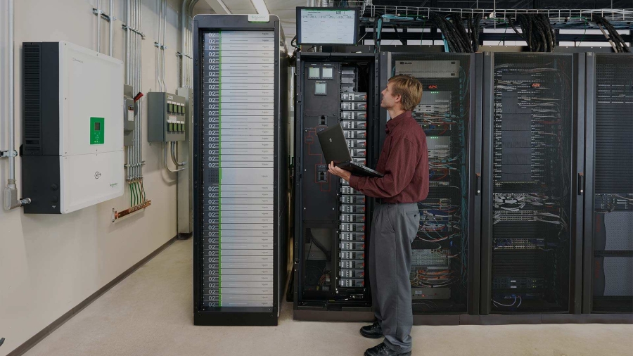 man in front of datacenter