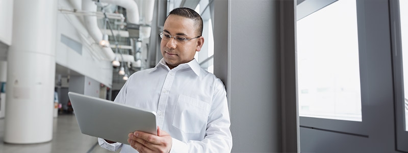 A person holding a tablet