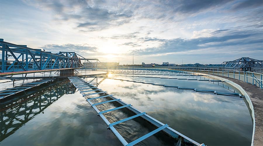 A water treatment plant with a bridge and a bridge