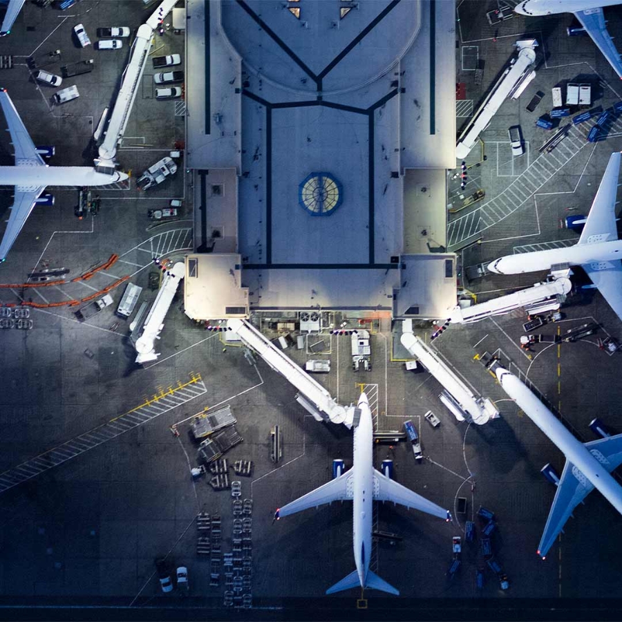 Aerial view of several airplanes at an airport