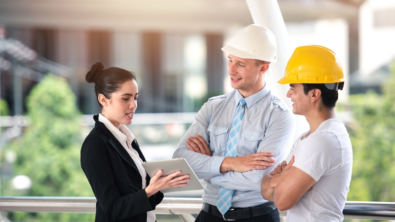 lady is talking to the facility engineers