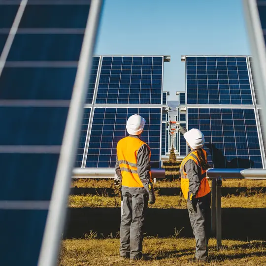 Two engineers on solar power station