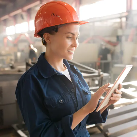 Smart electrician reads a brochure to provide maintenance services