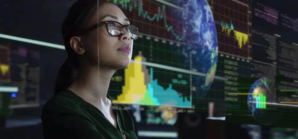 A young Asian woman looking at see through global & environmental data