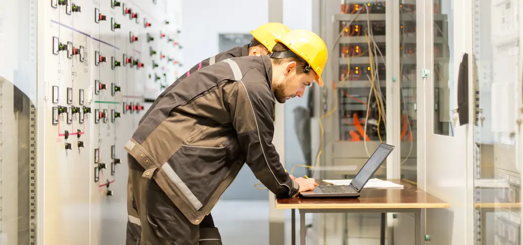 A panel builder performing maintenance tasks