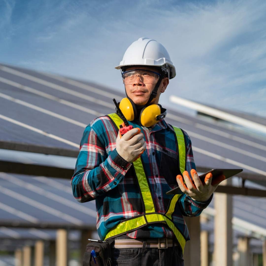 Electrician standing in solar Power plant