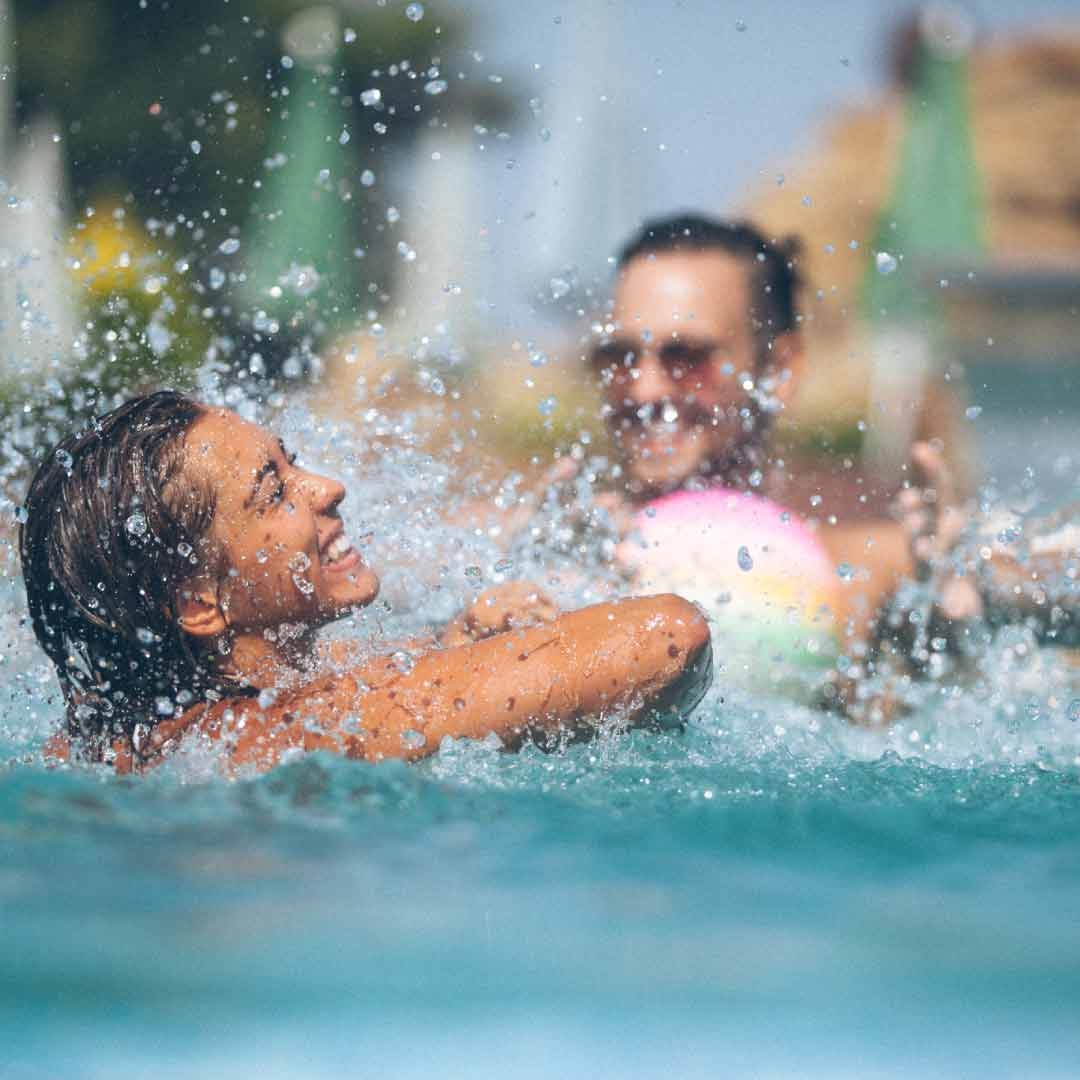 A woman is playing in the water