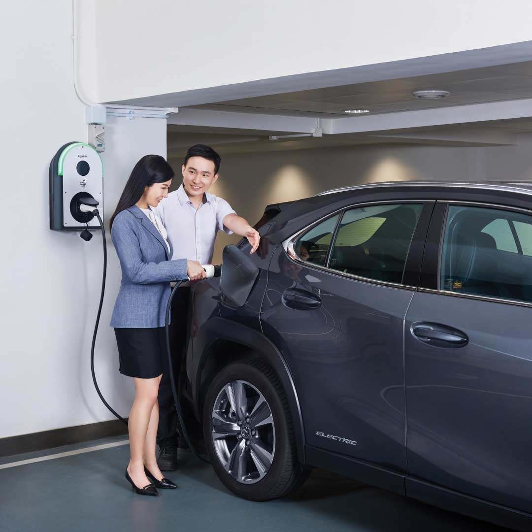 Two people are charging the car