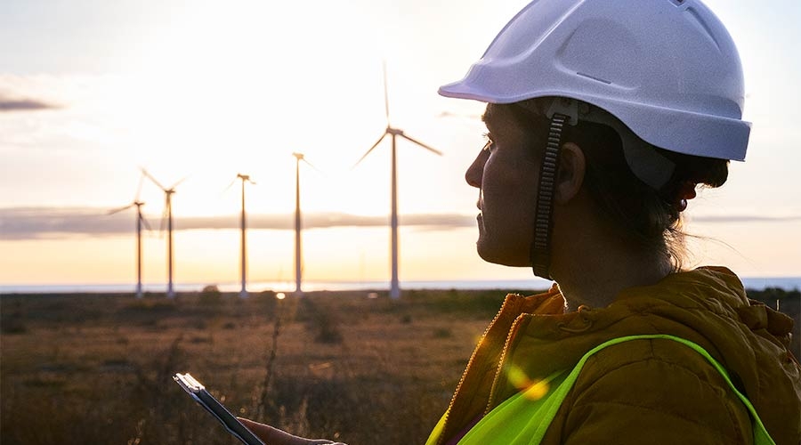 A person in a hard hat and a white helmet