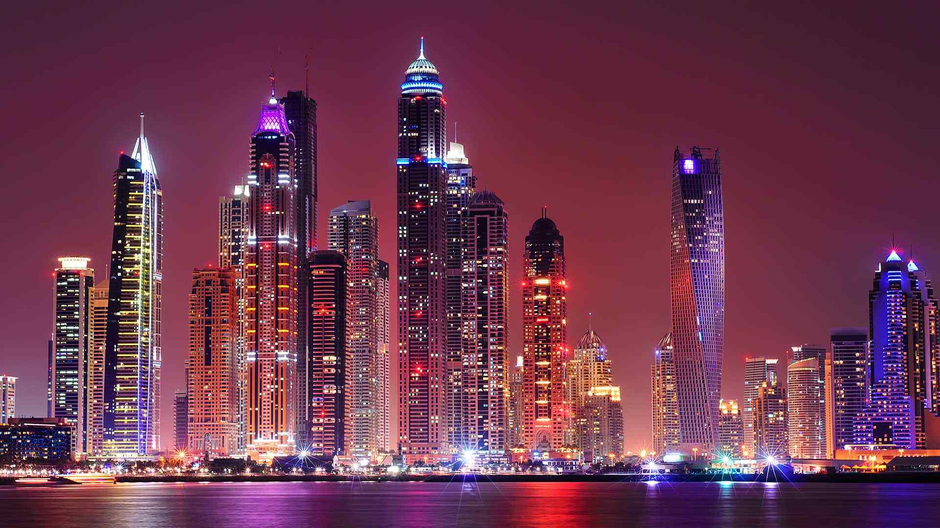 Wide angle aerial view of the skyline of a smart city during sunset