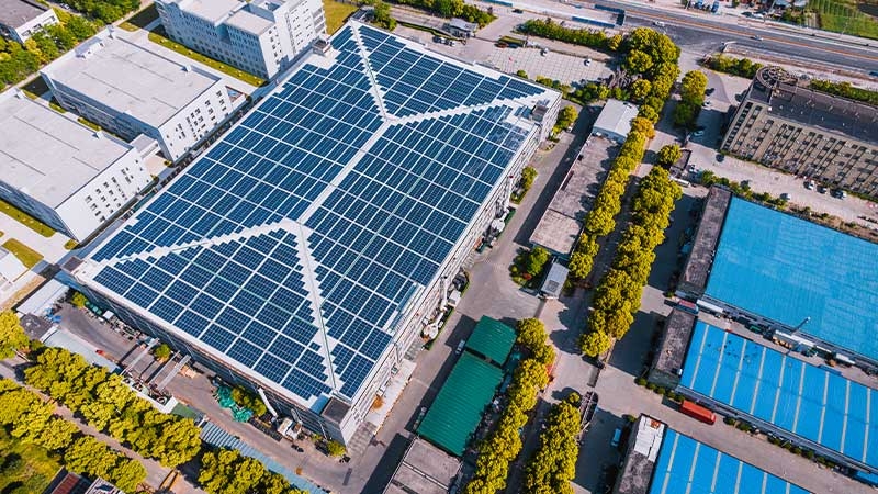 A building with solar panels on top