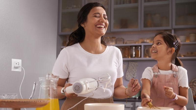 Mother and her daughter cooking