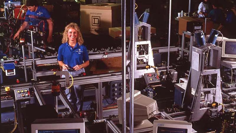 A person standing in a factory