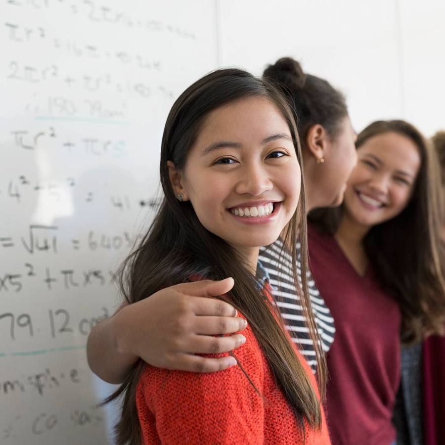 Closeup of a girl smiling with her friends