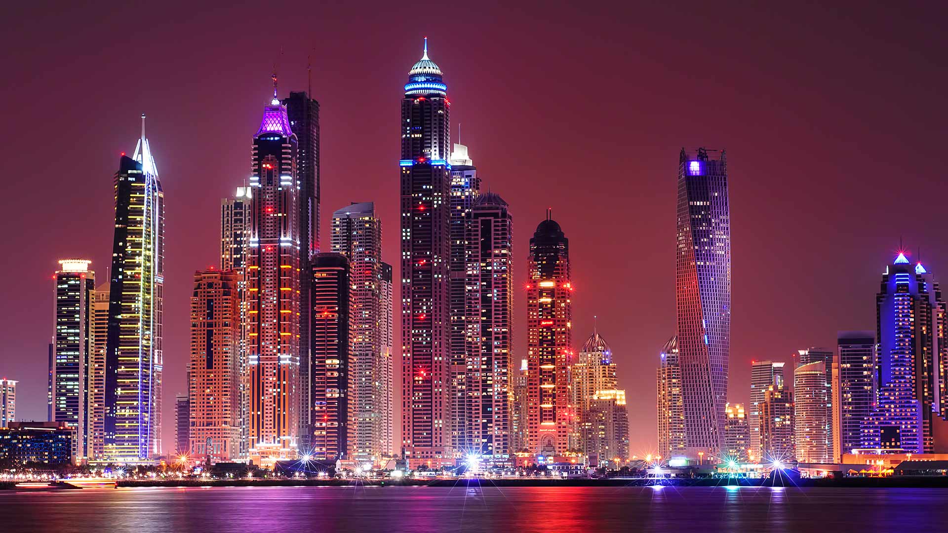 Wide angle aerial view of the skyline of a smart city during sunset