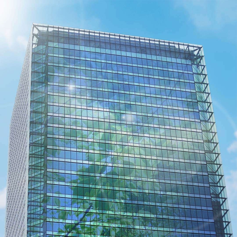 company building with tree reflection