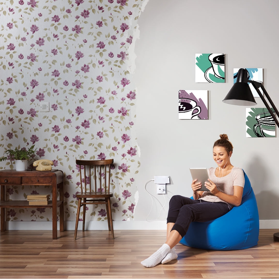 A woman sitting in living area in house