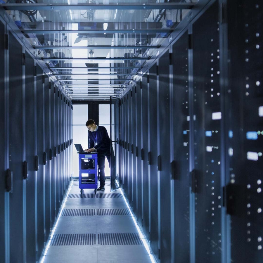 Male Engineer in server room