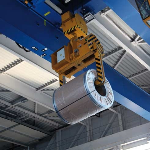 Overhead crane inside industrial plant, hoisting, industrial automation, machine control.