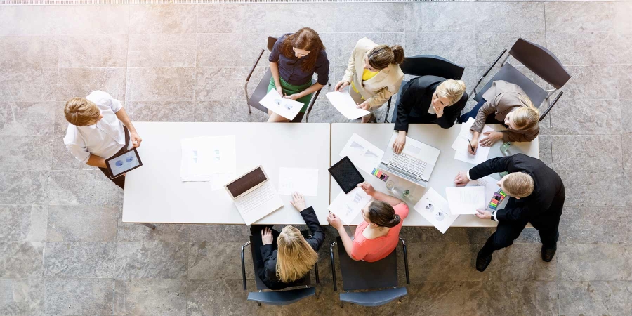 A group of people sitting around a table