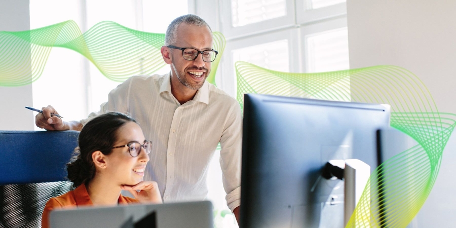 Employees working in office with computer