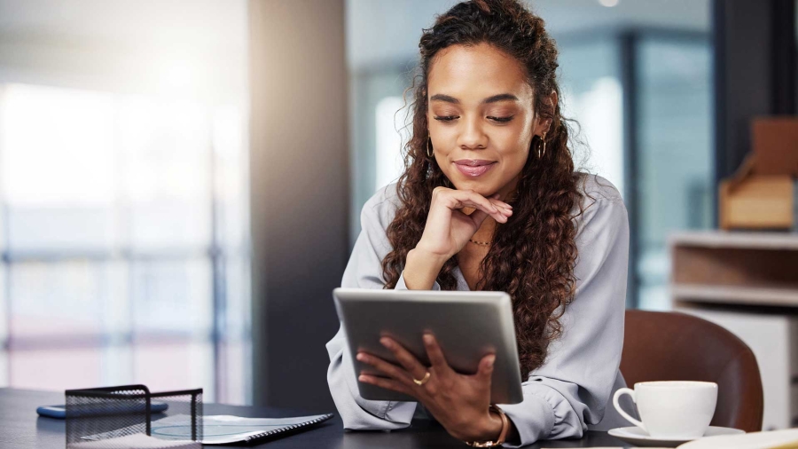 A person holding a tablet