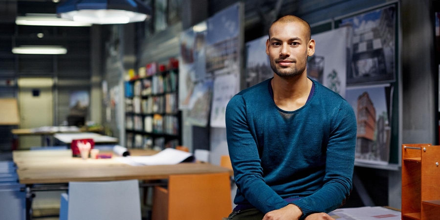 man take picture in office cabin