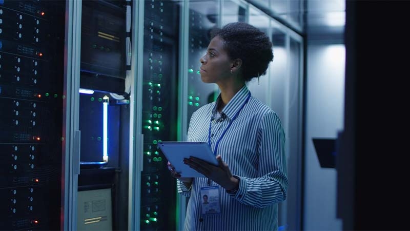 woman looking at a datacenter