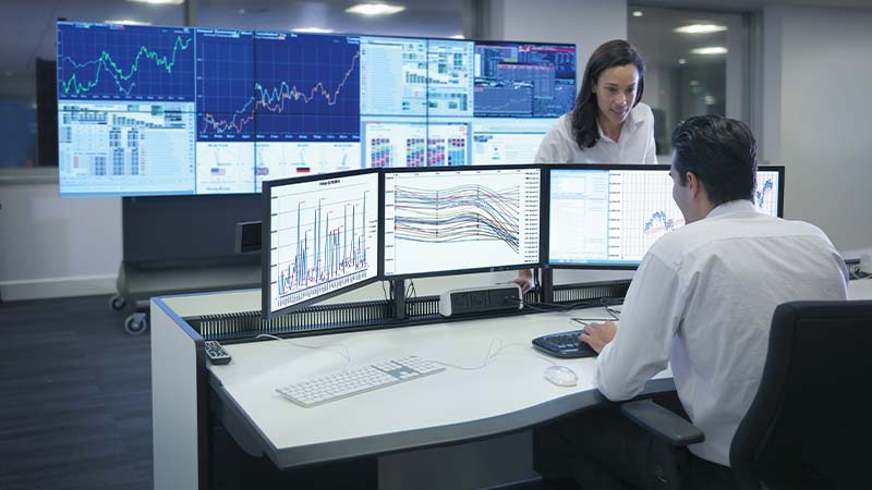 A group of people working on computers