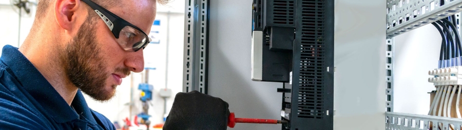 Electrician repairing the electrical module