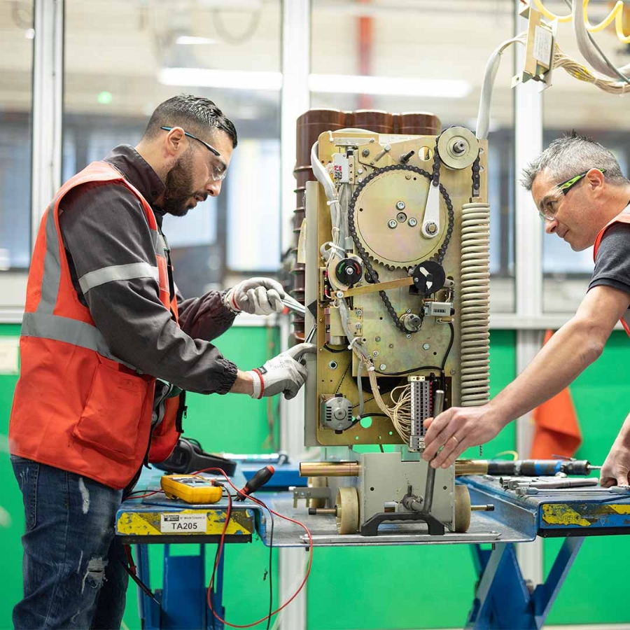 Men working on a machine