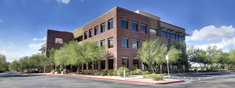 A building with trees around it