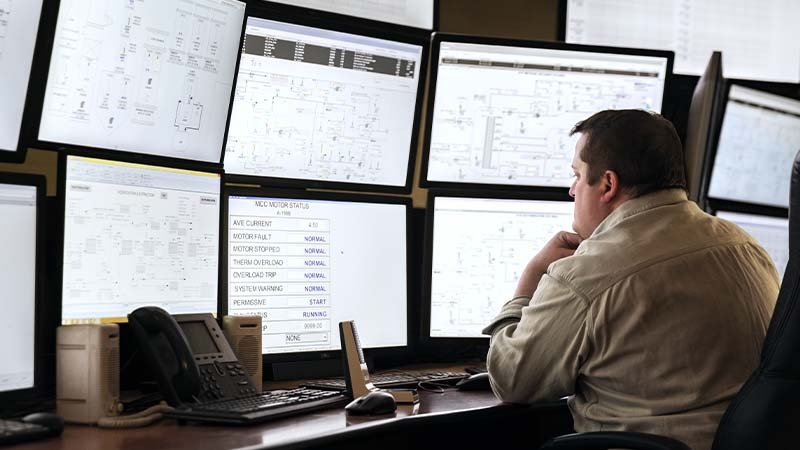 A person looking at a computer screen