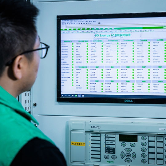 A man working on computer in lab