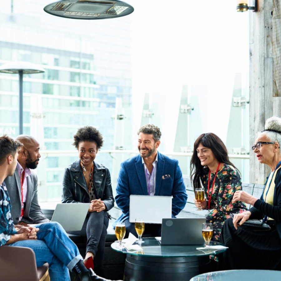 A group of people sitting around a table