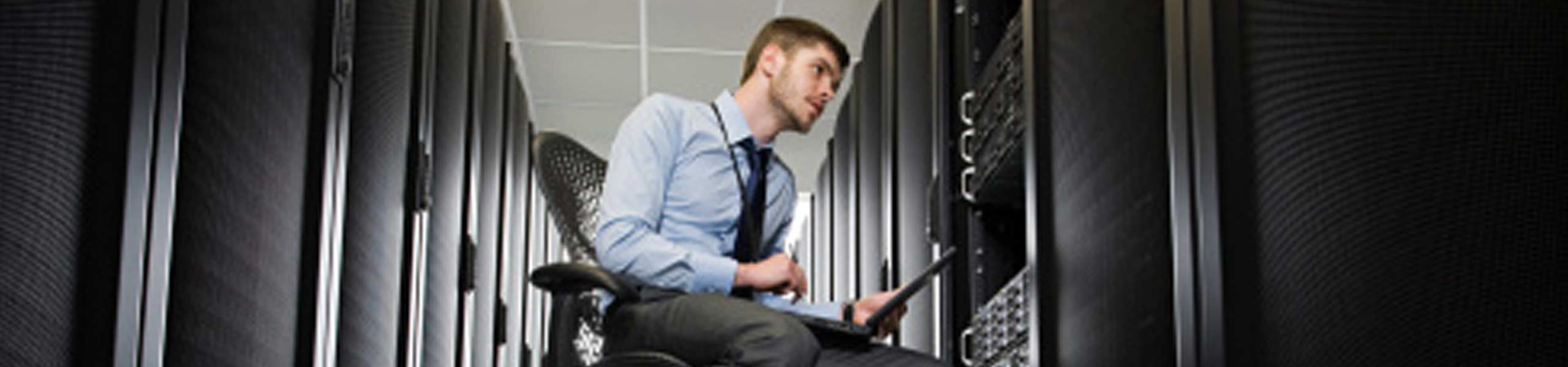 Computer technician working on a server